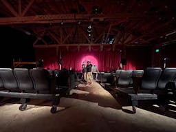 Gorgeous Space with moveable Seats and Red Velvet Curtains - Image 19