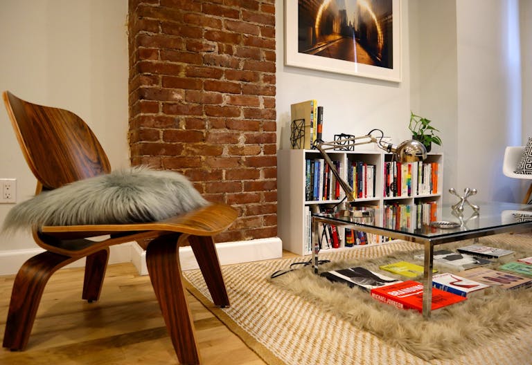 Minimalist mid-century modern lounge space and modern kitchen - Image 1