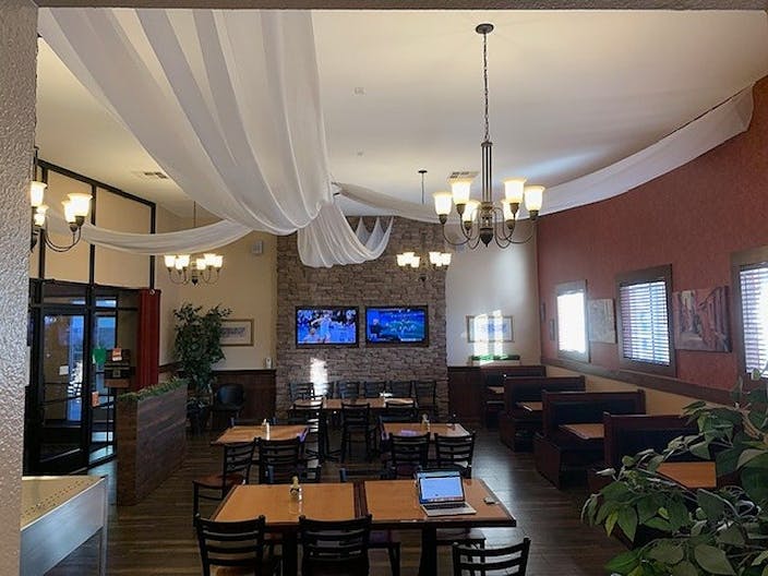 Elegant Restaurant Dining Space with TV's and Full Bar - Image 3