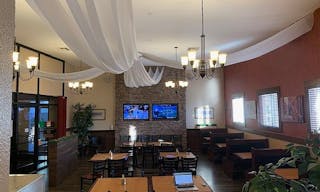 Elegant Restaurant Dining Space with TV's and Full Bar - Image 3