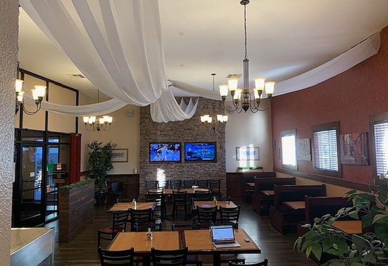 Elegant Restaurant Dining Space with TV's and Full Bar - Image 3