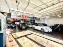 Luxury Car Dealership in Warehouse Space