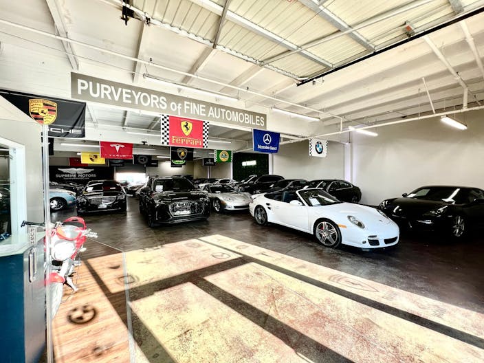 Luxury Car Dealership in Warehouse Space - Image 0
