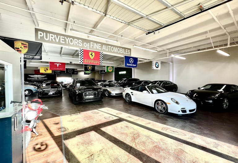 Luxury Car Dealership in Warehouse Space - Image 0
