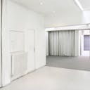 White-Washed Gallery In Vibrant Le Marais