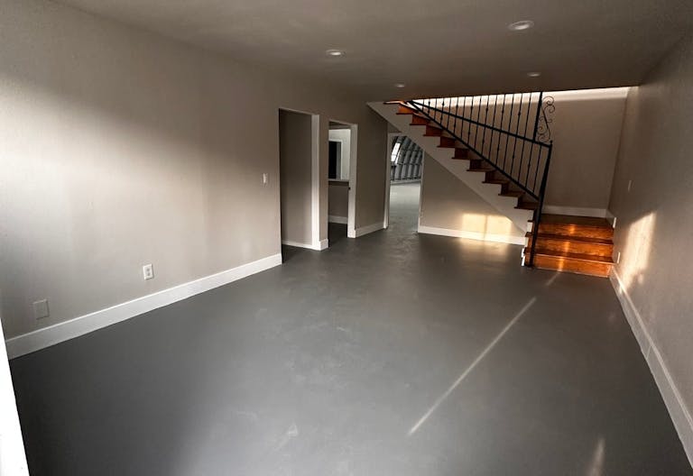 Large Empty Warehouse with high arched metal ceiling and lobby loft space - Image 3