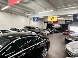 Luxury Car Dealership in Warehouse Space - Image 8