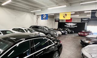 Luxury Car Dealership in Warehouse Space - Image 8
