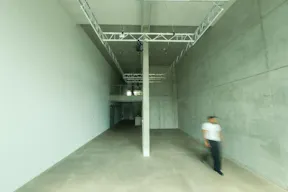 Brutalist Event & Retail Space with Rooftop and Garden - Image 4