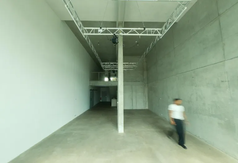 Brutalist Event & Retail Space with Rooftop and Garden - Image 4