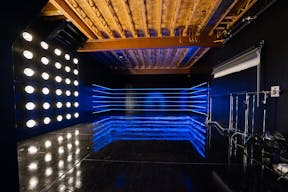 Large blackout studio with high ceilings, a Sport Bike, controllable sound synchronized RGB Lights, and RGB Tunnel for car photo and video shoots - Image 1