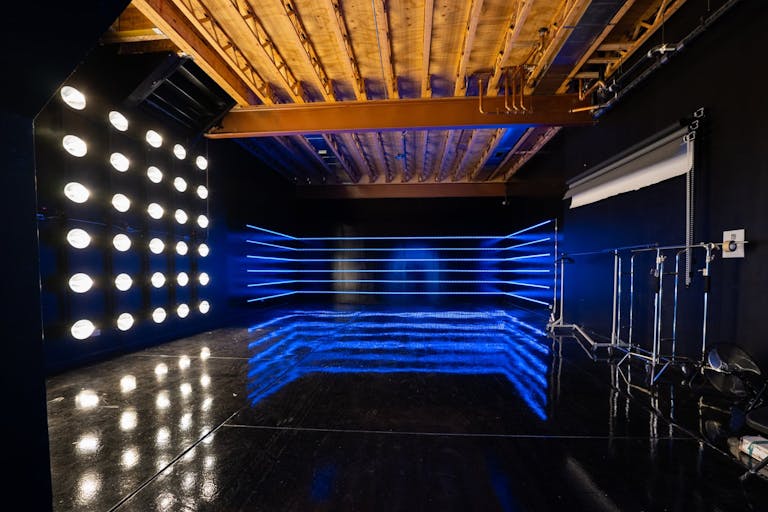 Large blackout studio with high ceilings, a Sport Bike, controllable sound synchronized RGB Lights, and RGB Tunnel for car photo and video shoots - Image 1