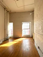 Gorgeous Authentic NYC Loft with White Brick and 15' Ceilings with Vinyl DJ Console - Image 4