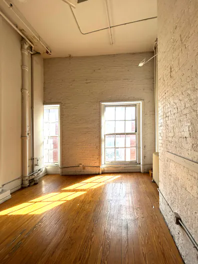 Gorgeous Authentic NYC Loft with White Brick and 15' Ceilings with Vinyl DJ Console - Image 4