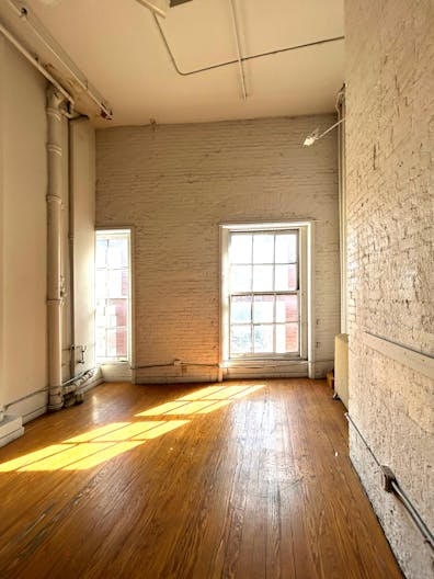 Gorgeous Authentic NYC Loft with White Brick and 15' Ceilings - Image 2