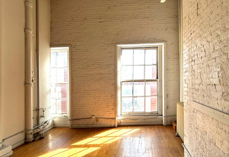 Gorgeous Authentic NYC Loft with White Brick and 15' Ceilings - Image 2