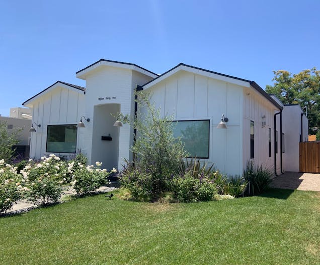 Modern Farmhouse with Beautiful Landscaping - Image 1