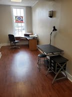 2nd floor front office 128sq.ft. over looking the square. - Image 0