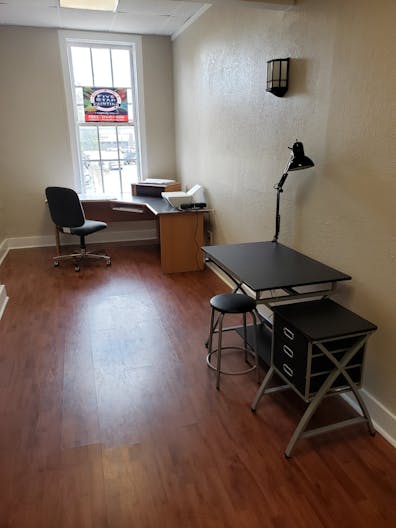 2nd floor front office 128sq.ft. over looking the square. - Image 0