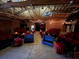 Gorgeous Space with moveable Seats and Red Velvet Curtains - Image 27