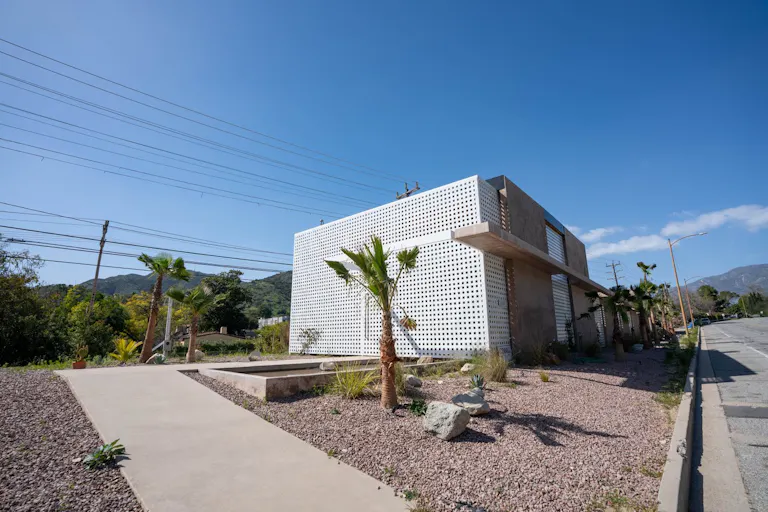 Concrete Oasis: A Villa Retreat with Poolside Serenity - Image 1