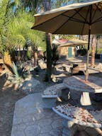 Vintage Train Car in Rustic Setting - Image 4