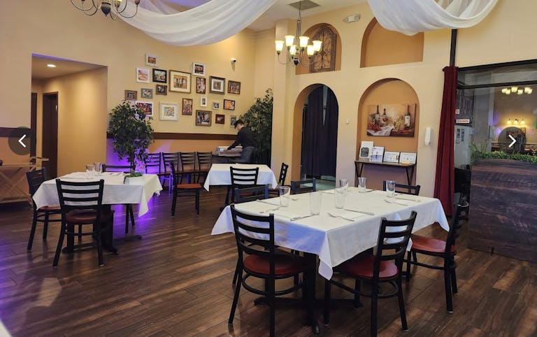 Elegant Restaurant Dining Space with TV's and Full Bar - Image 2