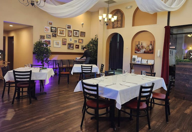 Elegant Restaurant Dining Space with TV's and Full Bar - Image 2