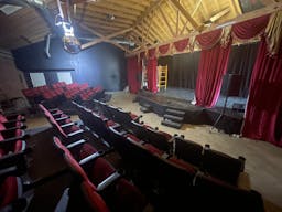 Gorgeous Space with moveable Seats and Red Velvet Curtains - Image 32