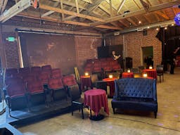 Gorgeous Space with moveable Seats and Red Velvet Curtains - Image 29