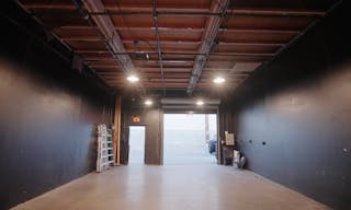 Black Box Warehouse w/ Grid System (Rain System, Seamless Backdrops, Props, Equipment, Furniture) - Image 0