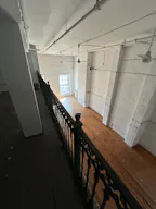 Gorgeous Authentic NYC Loft with White Brick and 15' Ceilings with Vinyl DJ Console - Image 6