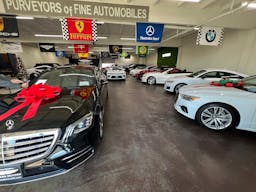 Luxury Car Dealership in Warehouse Space - Image 6