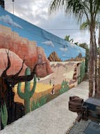 Vintage Train Car in Rustic Setting - Image 3