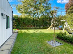 Modern Farmhouse with Beautiful Landscaping - Image 13