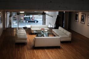 Stunning Mezzanine Lounge Overlooking Classic Car Showroom - Image 8