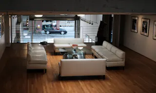 Stunning Mezzanine Lounge Overlooking Classic Car Showroom - Image 8