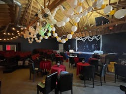 Gorgeous Space with moveable Seats and Red Velvet Curtains - Image 3