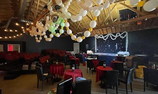 Gorgeous Space with moveable Seats and Red Velvet Curtains - Image 3