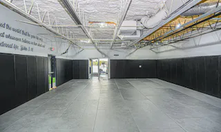 Huge Open Room set up with Floor & Wall Mats Perfect for a fitness or martial arts class or open meeting or anything you can think of. - Image 0