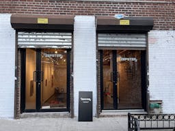 White Box with Brick Accent Wall Premium Gallery Space - Image 2