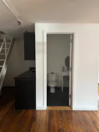 Gorgeous Authentic NYC Loft with White Brick and 15' Ceilings with Vinyl DJ Console - Image 9