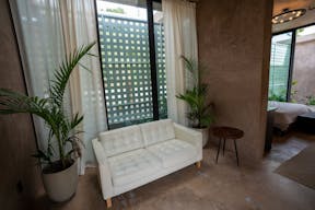 Concrete Oasis: A Villa Retreat with Poolside Serenity - Image 16