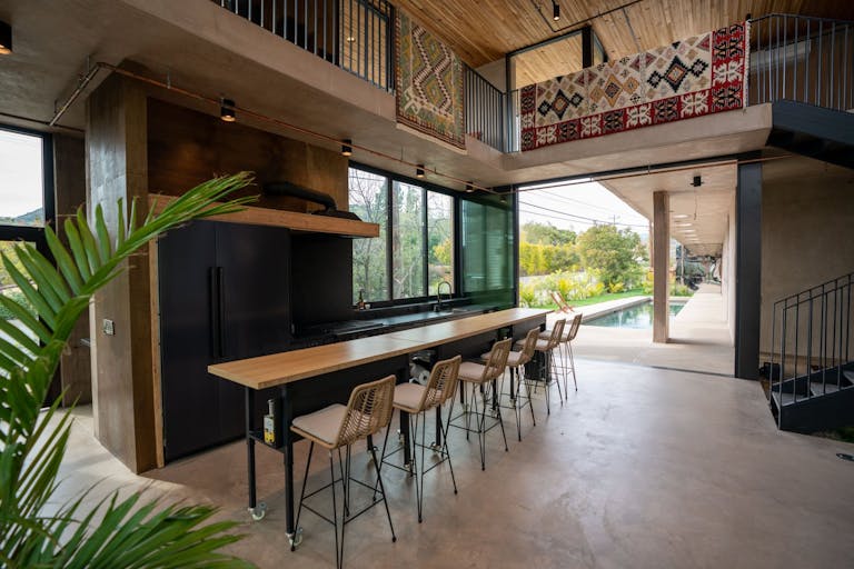 Concrete Oasis: A Villa Retreat with Poolside Serenity - Image 4