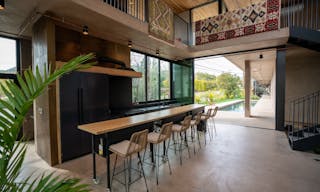 Concrete Oasis: A Villa Retreat with Poolside Serenity - Image 4