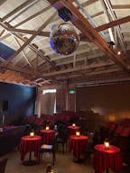 Gorgeous Space with moveable Seats and Red Velvet Curtains - Image 11