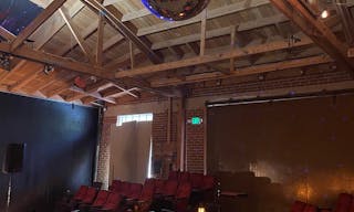 Gorgeous Space with moveable Seats and Red Velvet Curtains - Image 11