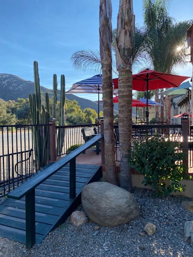 Vintage Train Car in Rustic Setting - Image 2