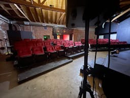 Gorgeous Space with moveable Seats and Red Velvet Curtains - Image 34