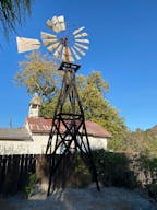 Vintage Train Car in Rustic Setting - Image 1